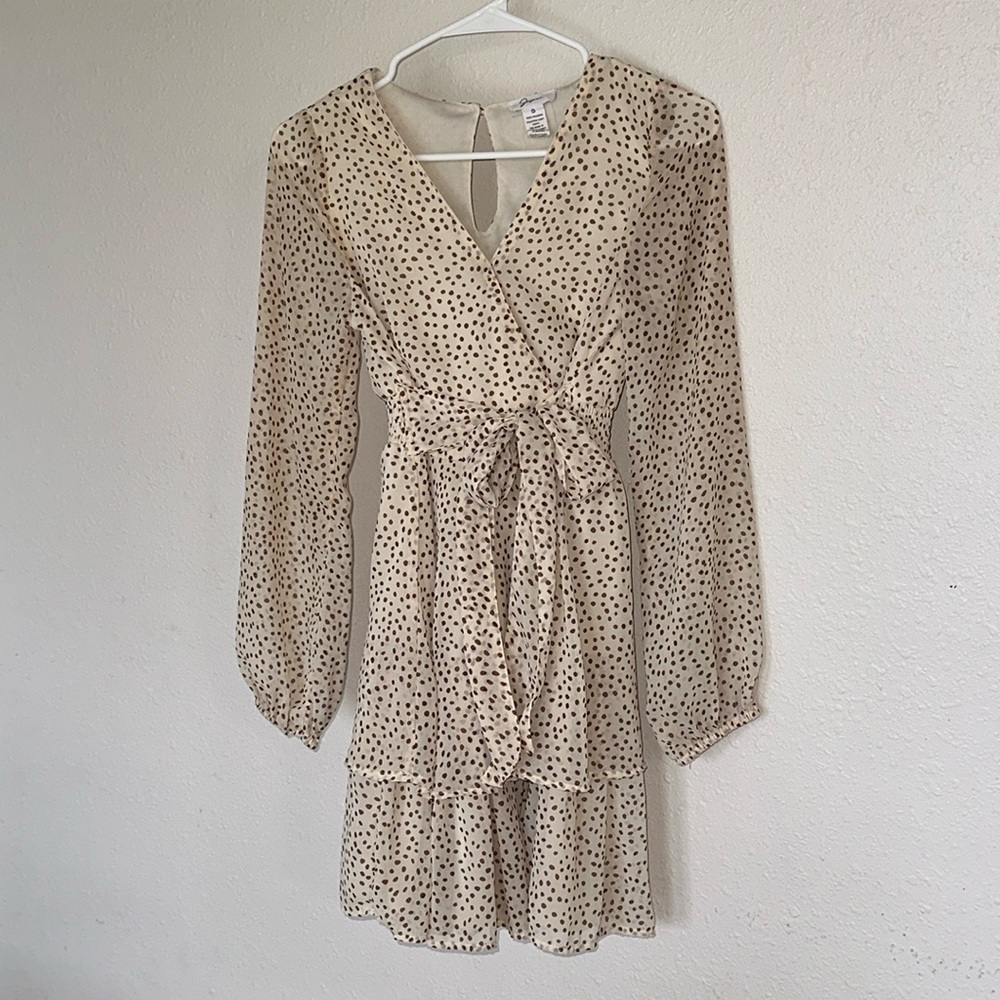 Cream colored dress with light brown polkadots